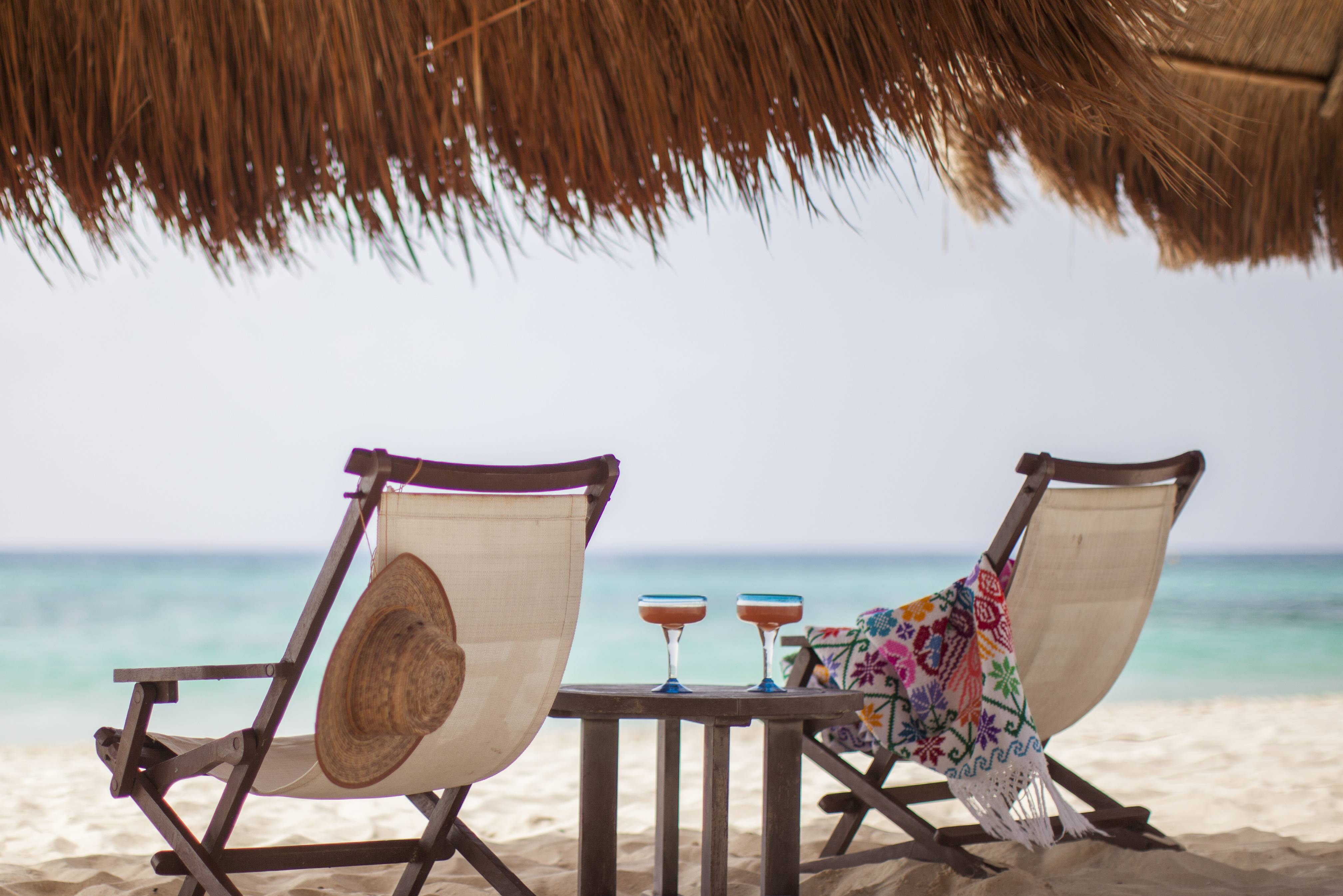 Genieten op het strand van het Mahekal Beach Resort in Playa del Carmen in Mexico