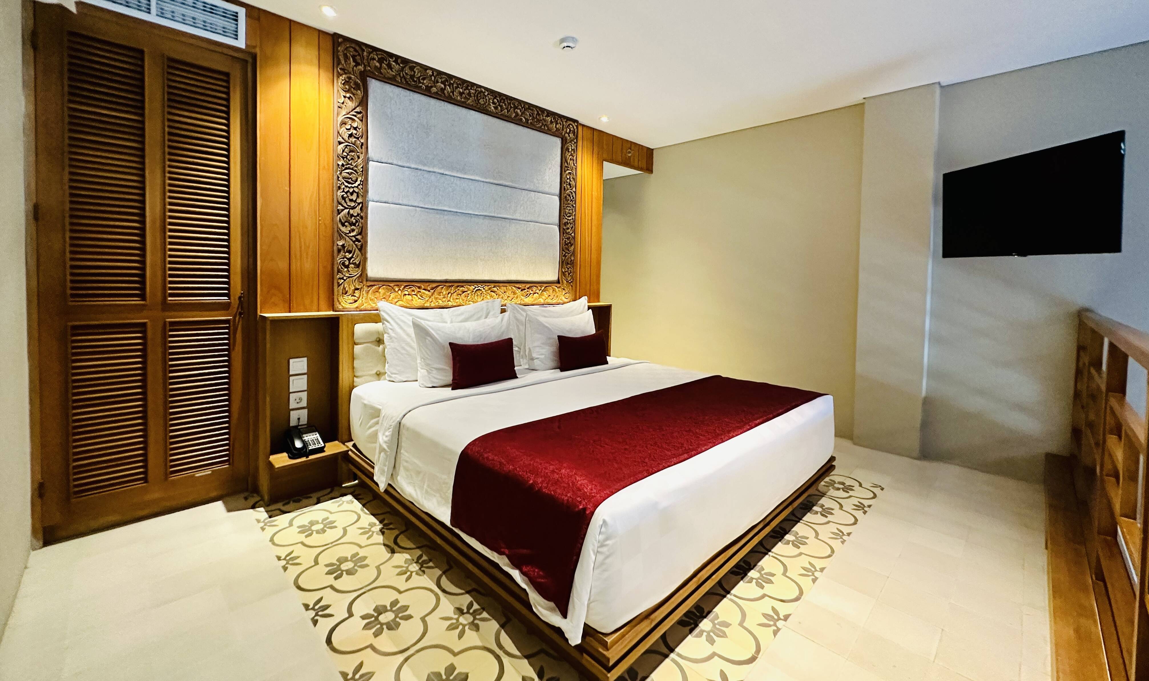 Ouderslaapkamer boven in de Duplex Family Suite in het Swarga Suites Bali Berawa in Canggu