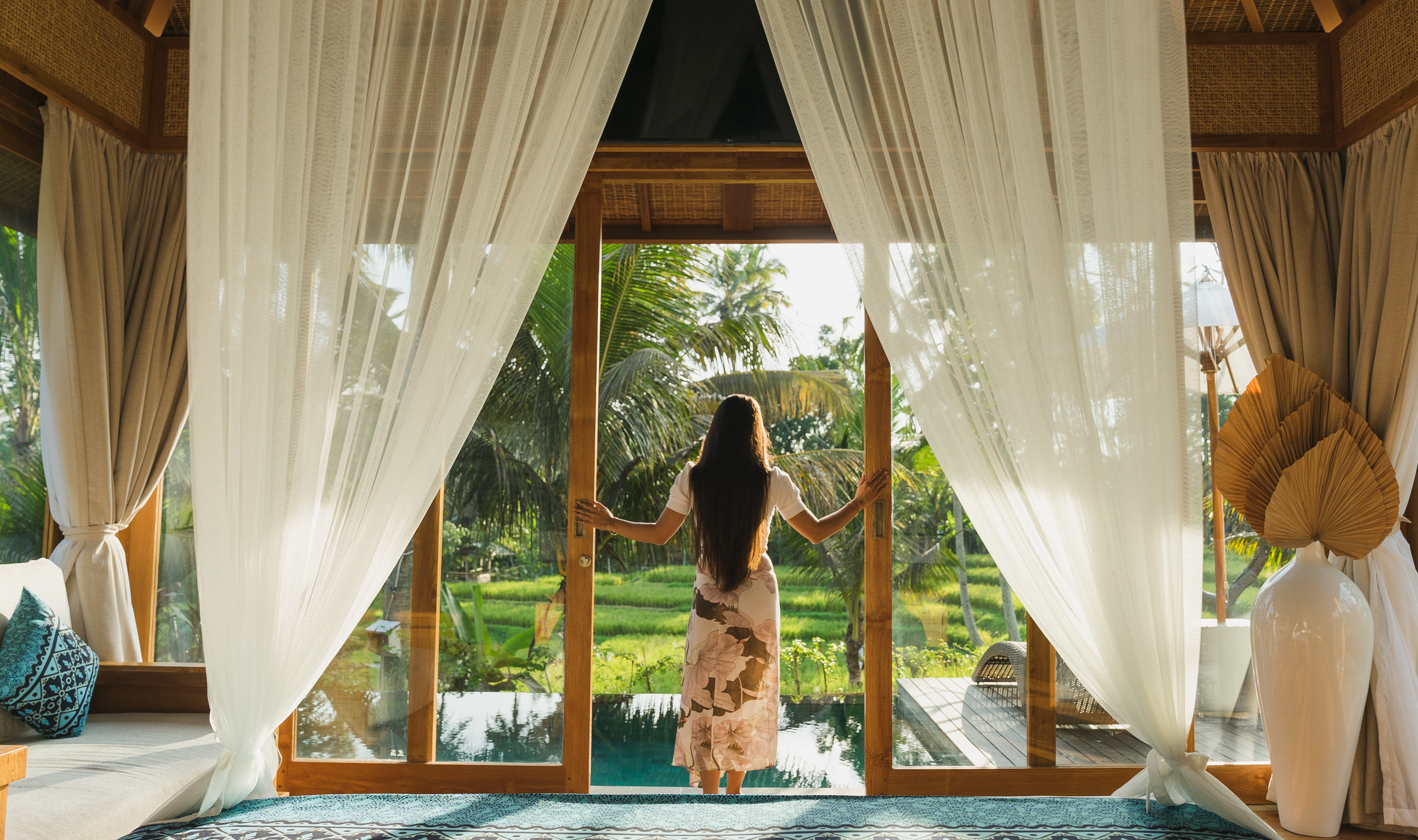 Uitzicht vanuit de One Bedroom Pool Villa with Rice Field View in het Kappa Senses Ubud op Bali in Indonesie