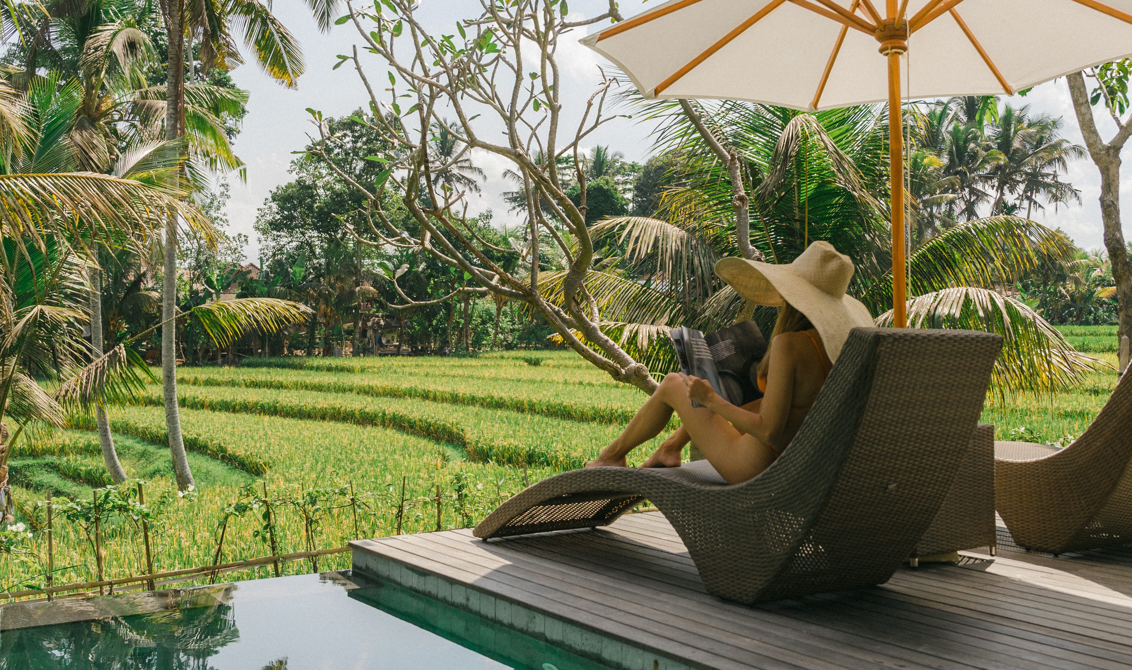Terras van de One Bedroom Pool Villa with Rice Field View in het Kappa Senses Ubud op Bali in Indonesie