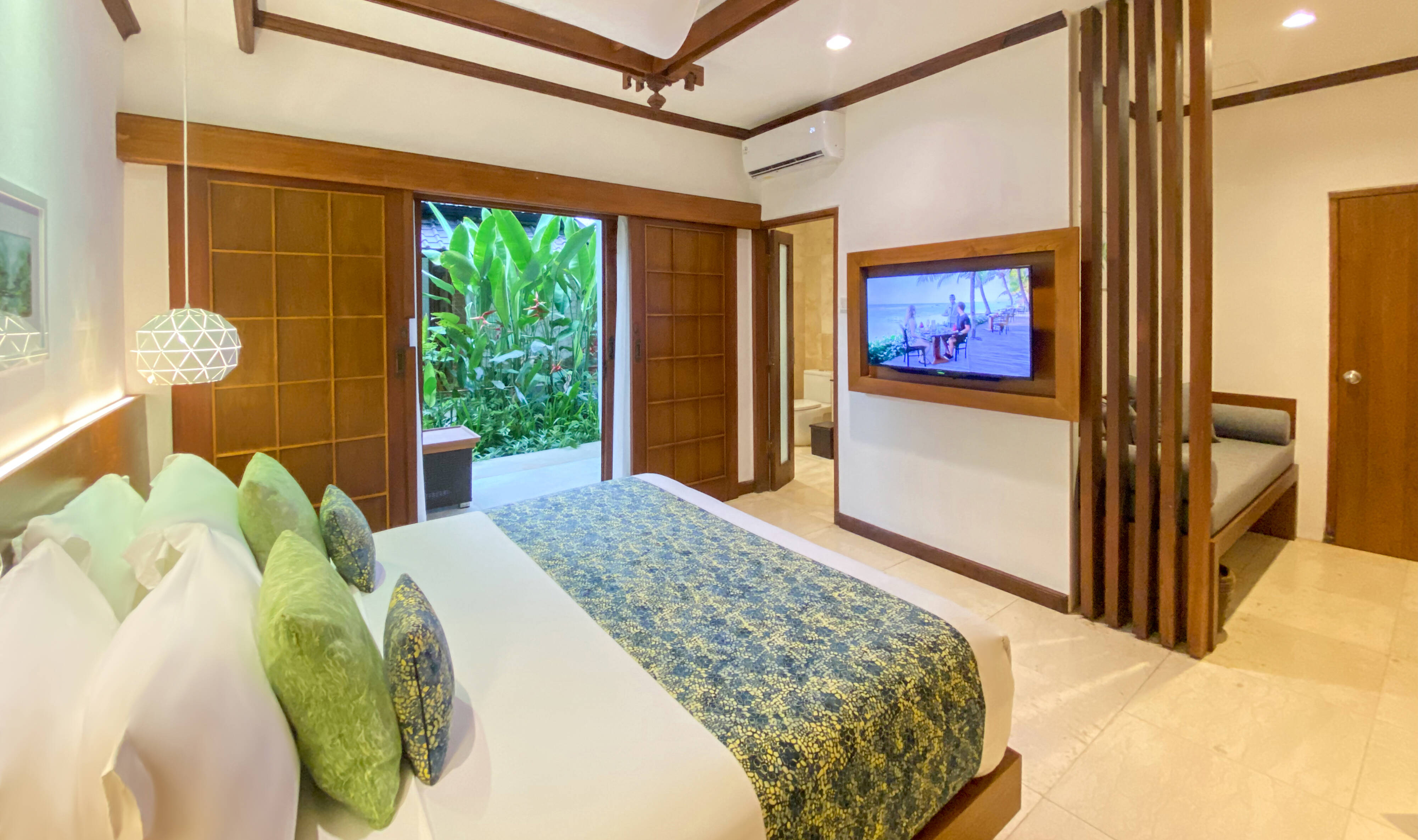 Deluxe Garden kamer in het Candi Beach Resort in Candidasa op Bali