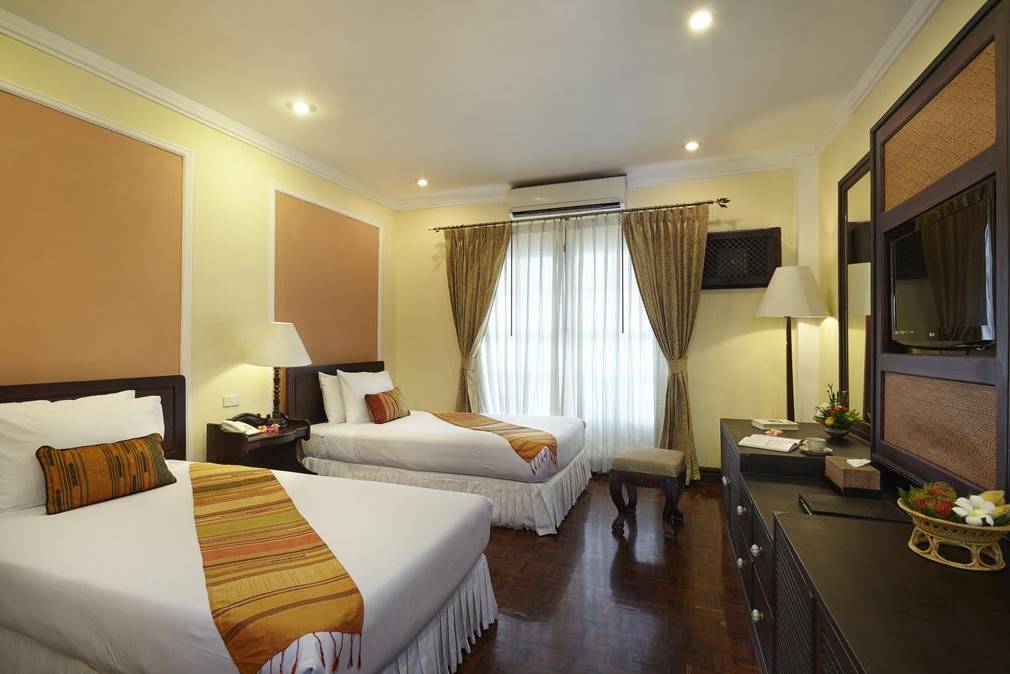 kamer van villa sant resort in laos vientiane