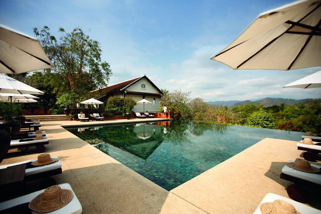 zwembad van la residence phou vo view in laos luang prabang