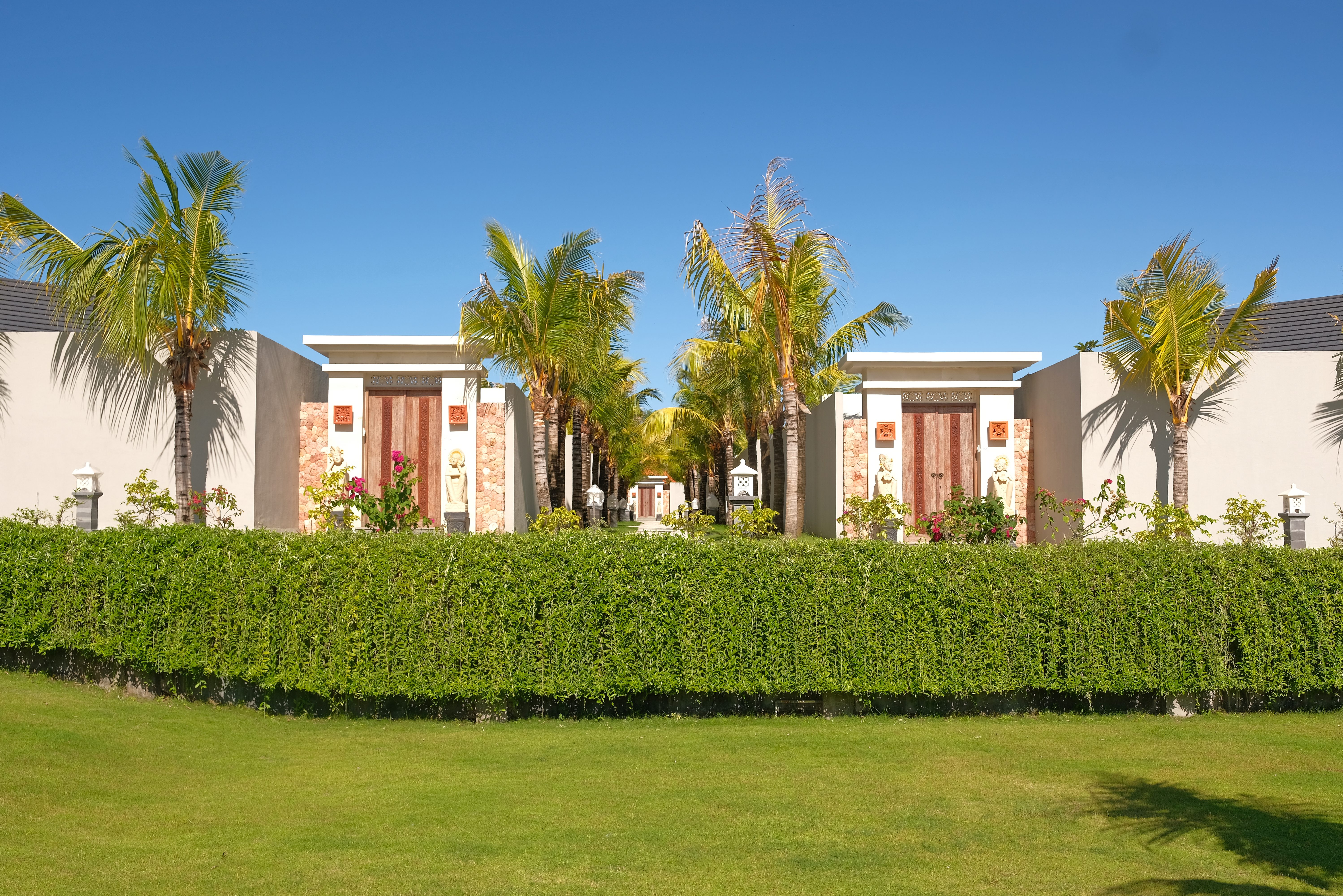 Tuin met de villa's in het Vivara Bali in Jimbaran