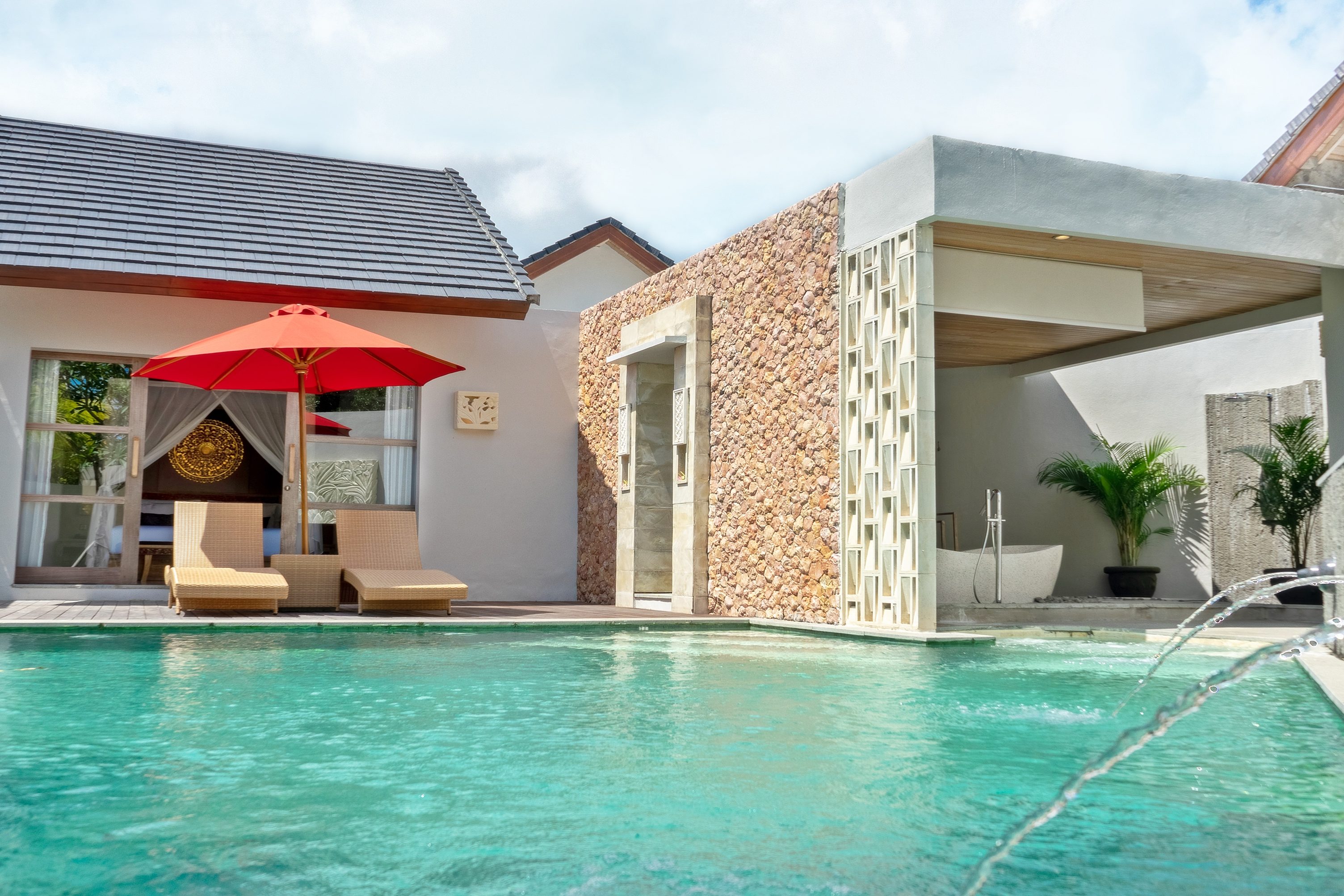 Tuin met zwembad van One Bedroom Poolvilla in Vivara Bali in Jimbaran