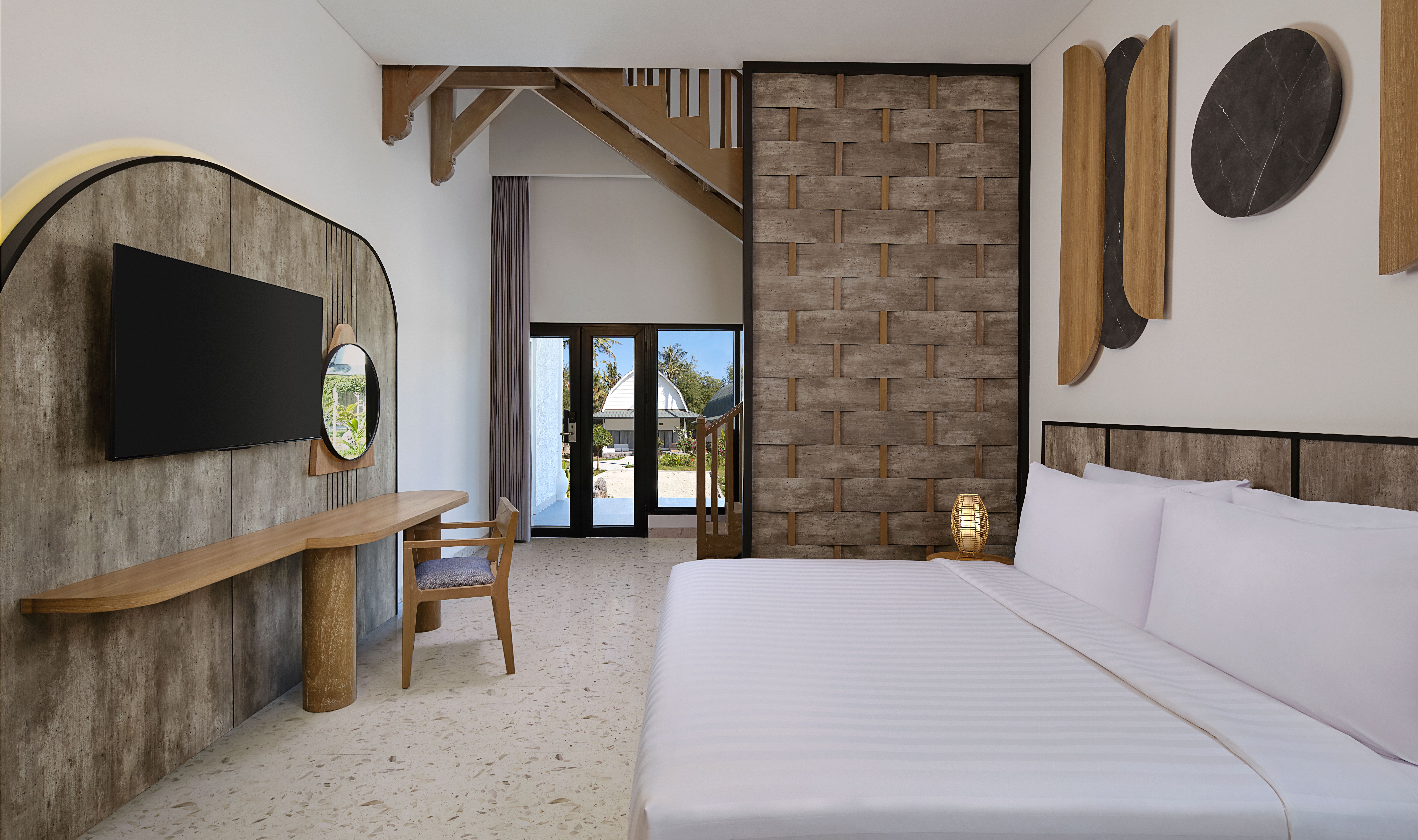 Master bedroom in de Family Suite Duplex in Jambuluwuk Ocean Boutique Resort op Gili Trawangan