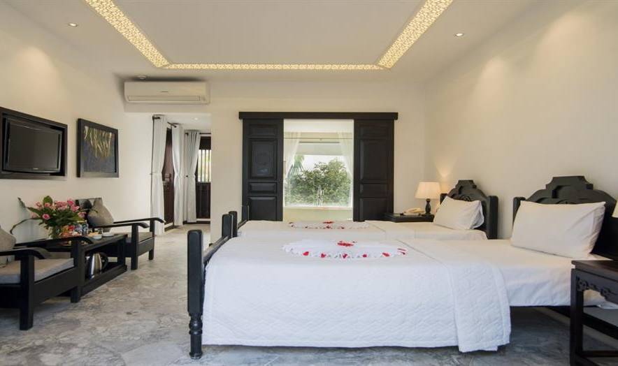 Superiorkamer in het Ancient House Resort Hoi An in Vietnam