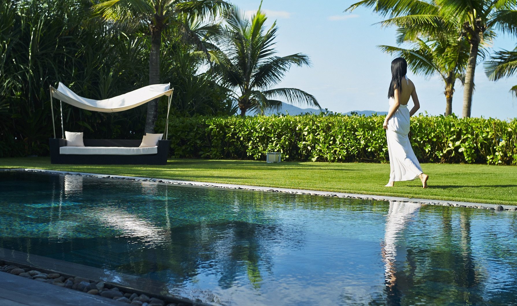 3-Bedroom Grand Beach Villa tuin in het Fusion Maia Danang Resort in Vietnam