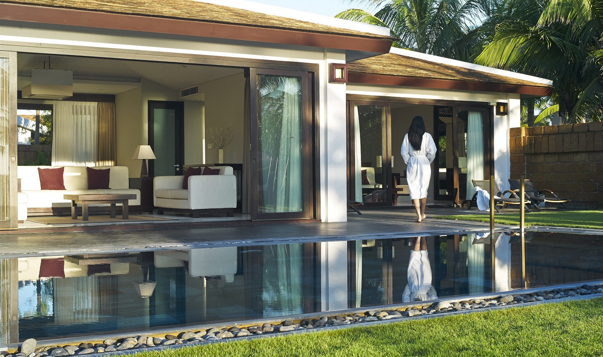 3-Bedroom Grand Beach Villa tuin in het Fusion Maia Danang Resort in Vietnam