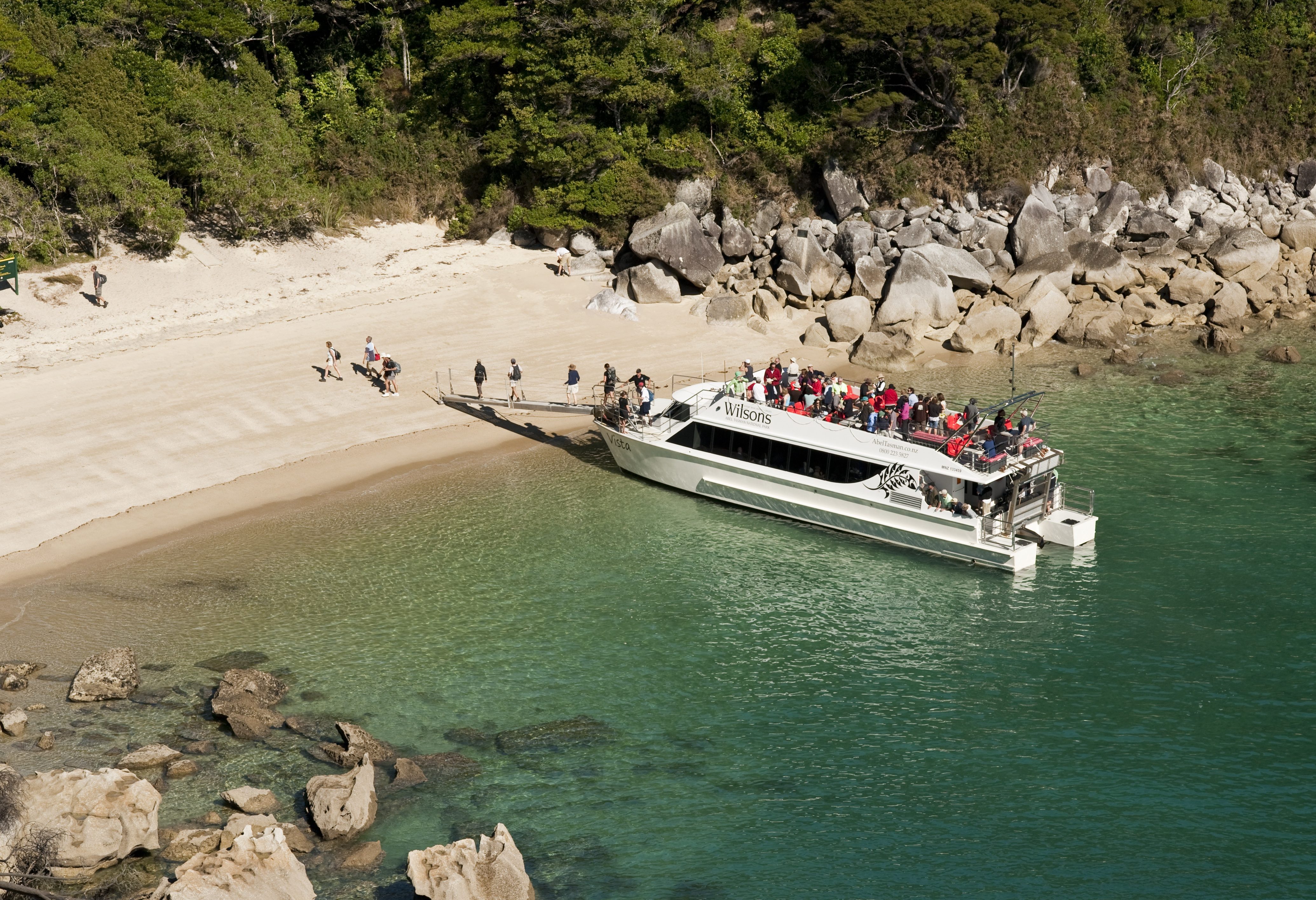 Start van wandeling in het Abel Tasman National Park in Nieuw-Zeeland