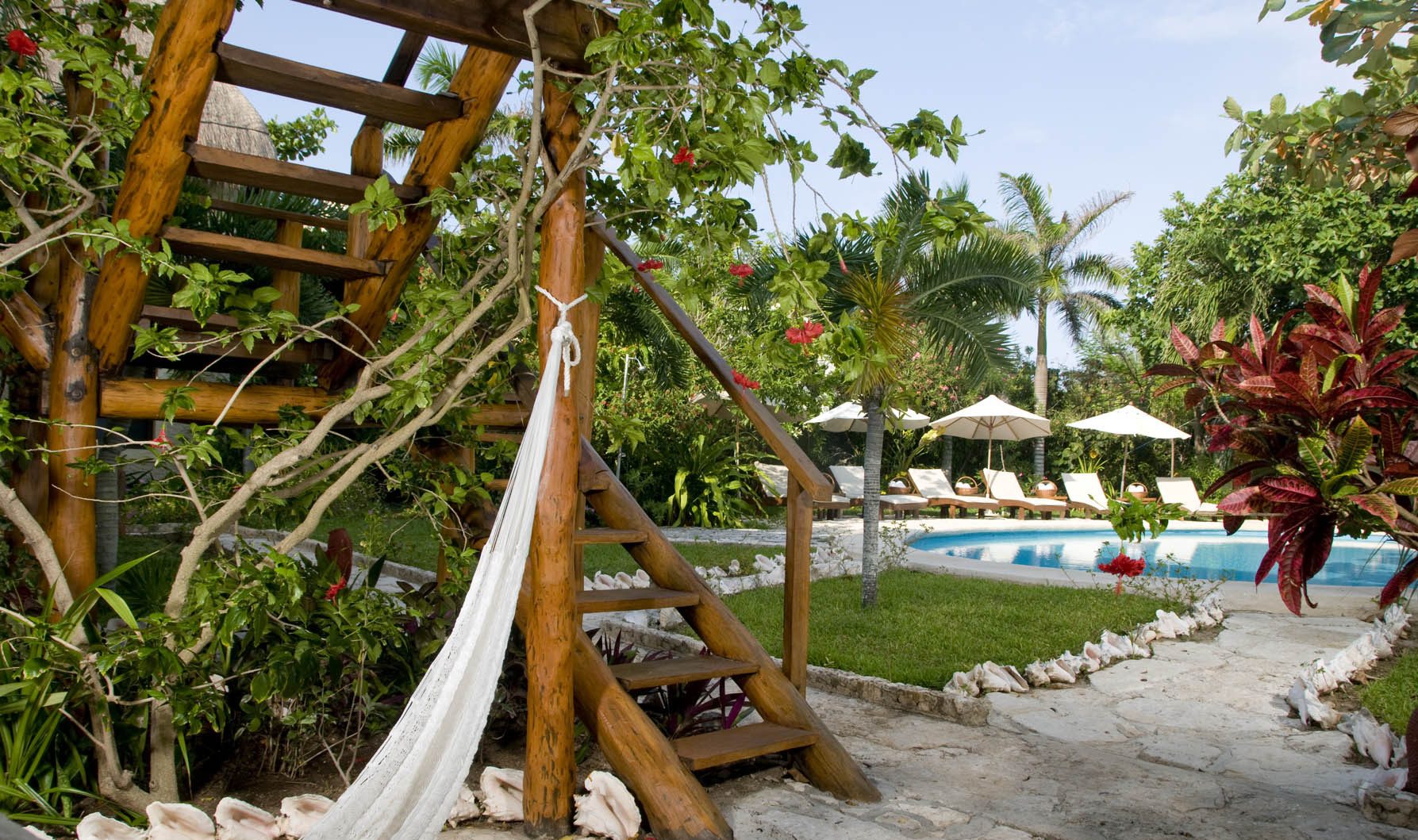 Poolside kamer Na Balam Beach Hotel Isla Mujeres strandvakantie Mexico
