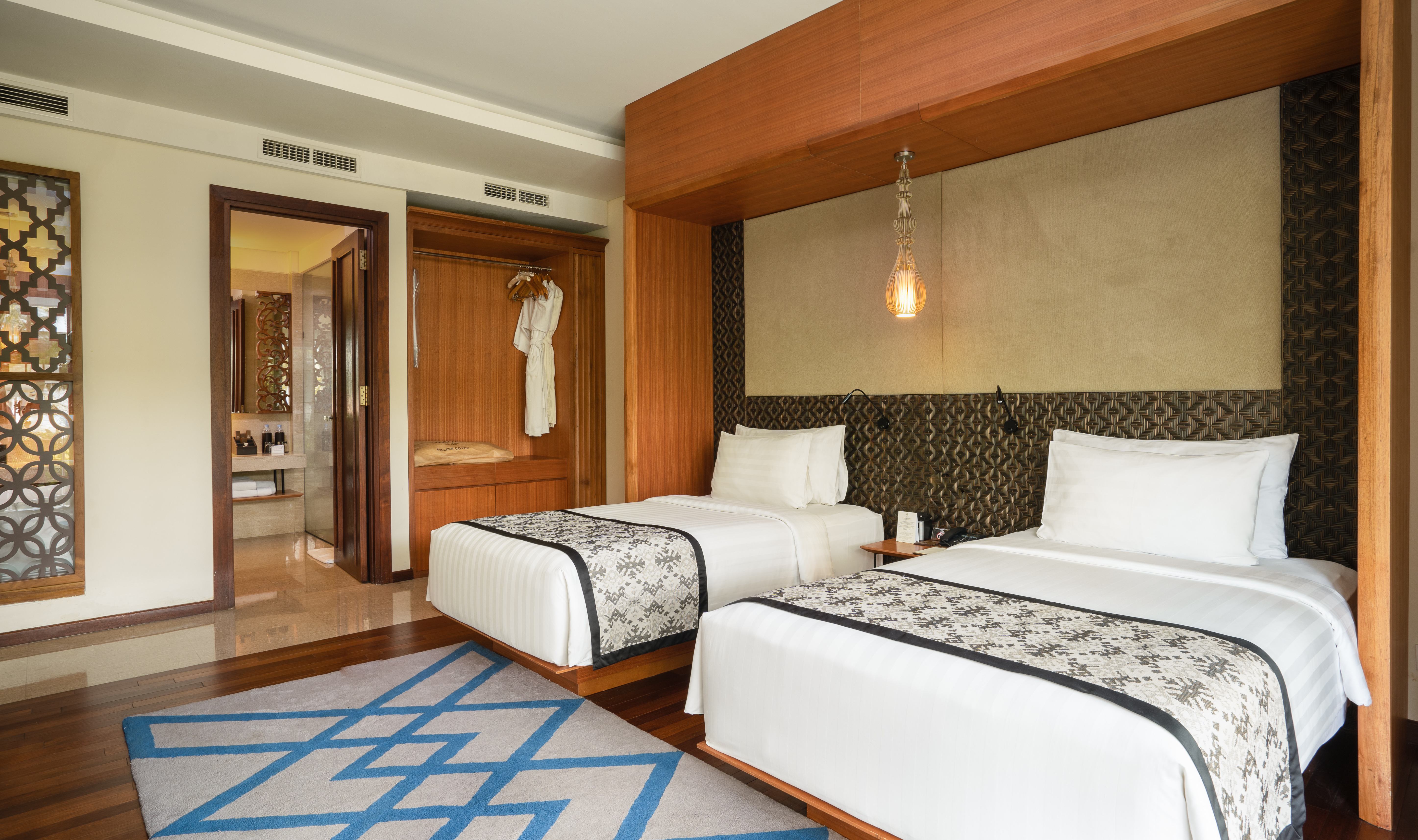 Two Bedroom Suite twin slaapkamer in het Merusaka Nusa Dua op Bali in Indonesie