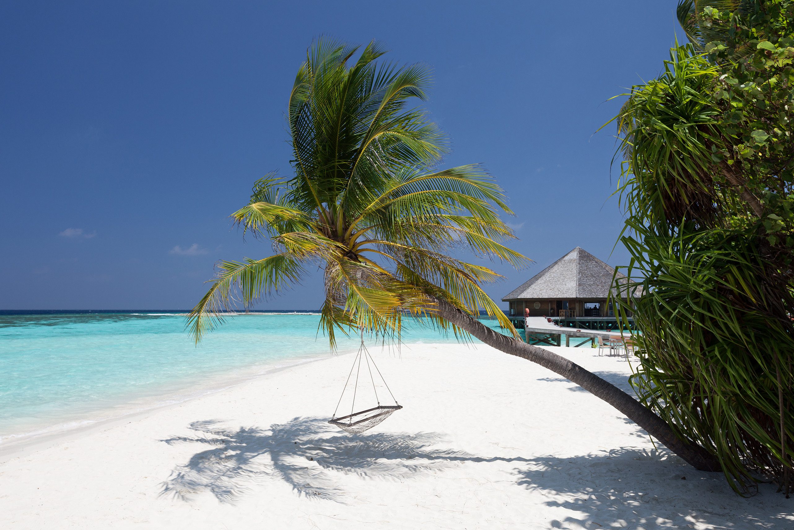 Vilamendhoo Resort op de Malediven strand