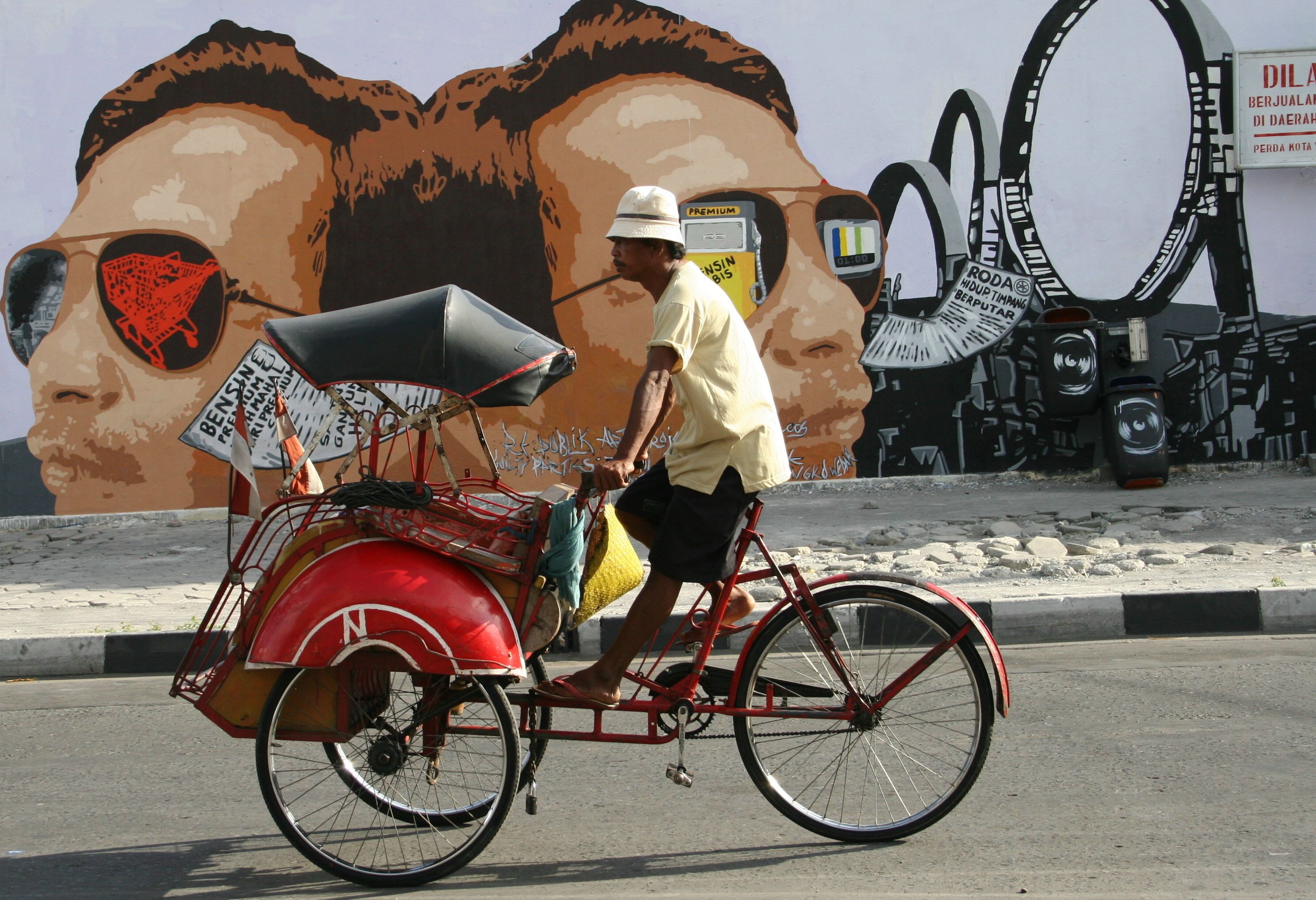 Becak in Yogyakarta op Java in Indonesie