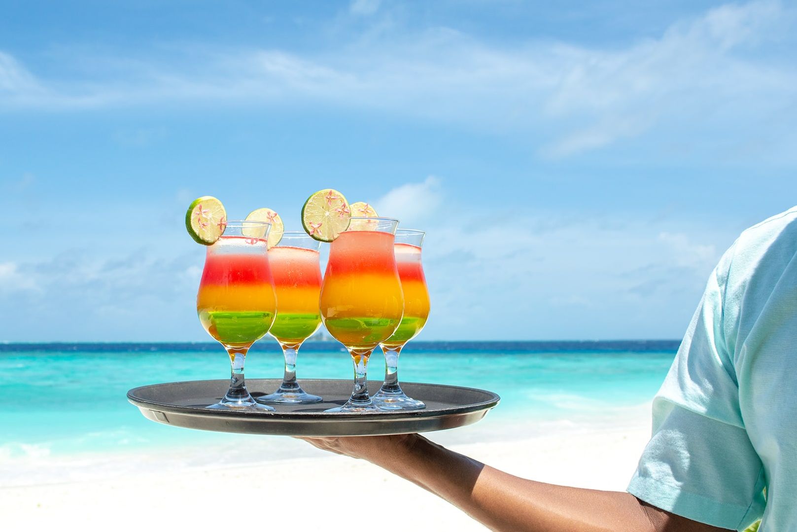 Malediven Fihalhohi Island Resort Strand Service