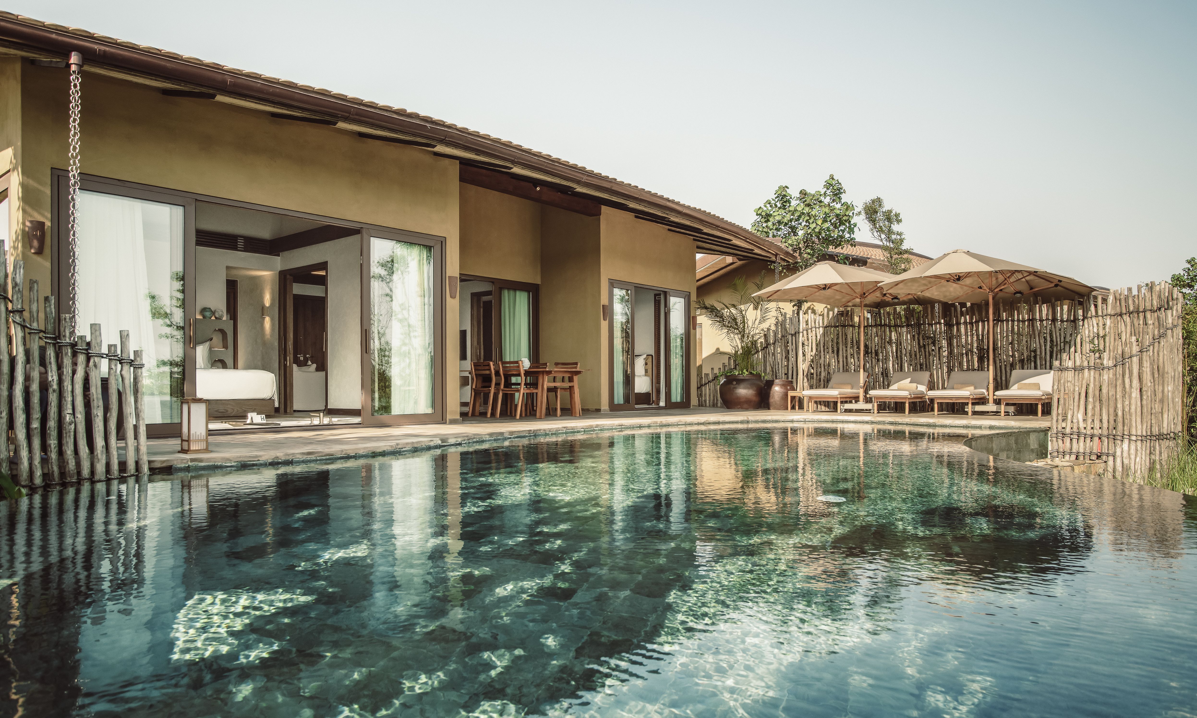 Vietnam-Hoi-An-Namia-River-Retreat-River-Family-Villa-terras-met-pool