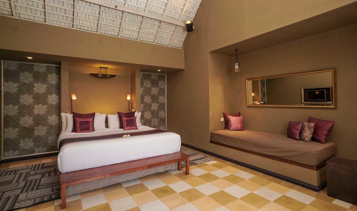 Slaapkamer in de 1-Bedroom Poolvilla in het Space Villas Bali in Seminyak