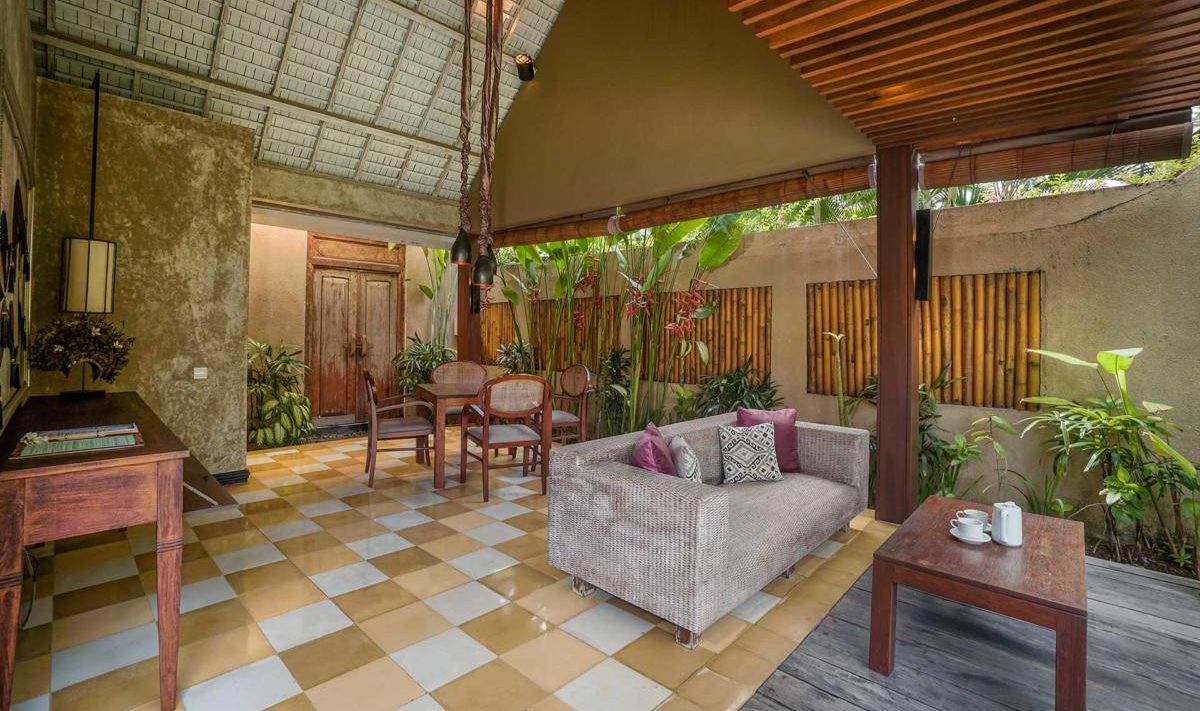 Halfopen woonkamer van de 1-Bedroom Poolvilla in het Space Villas Bali in Seminyak