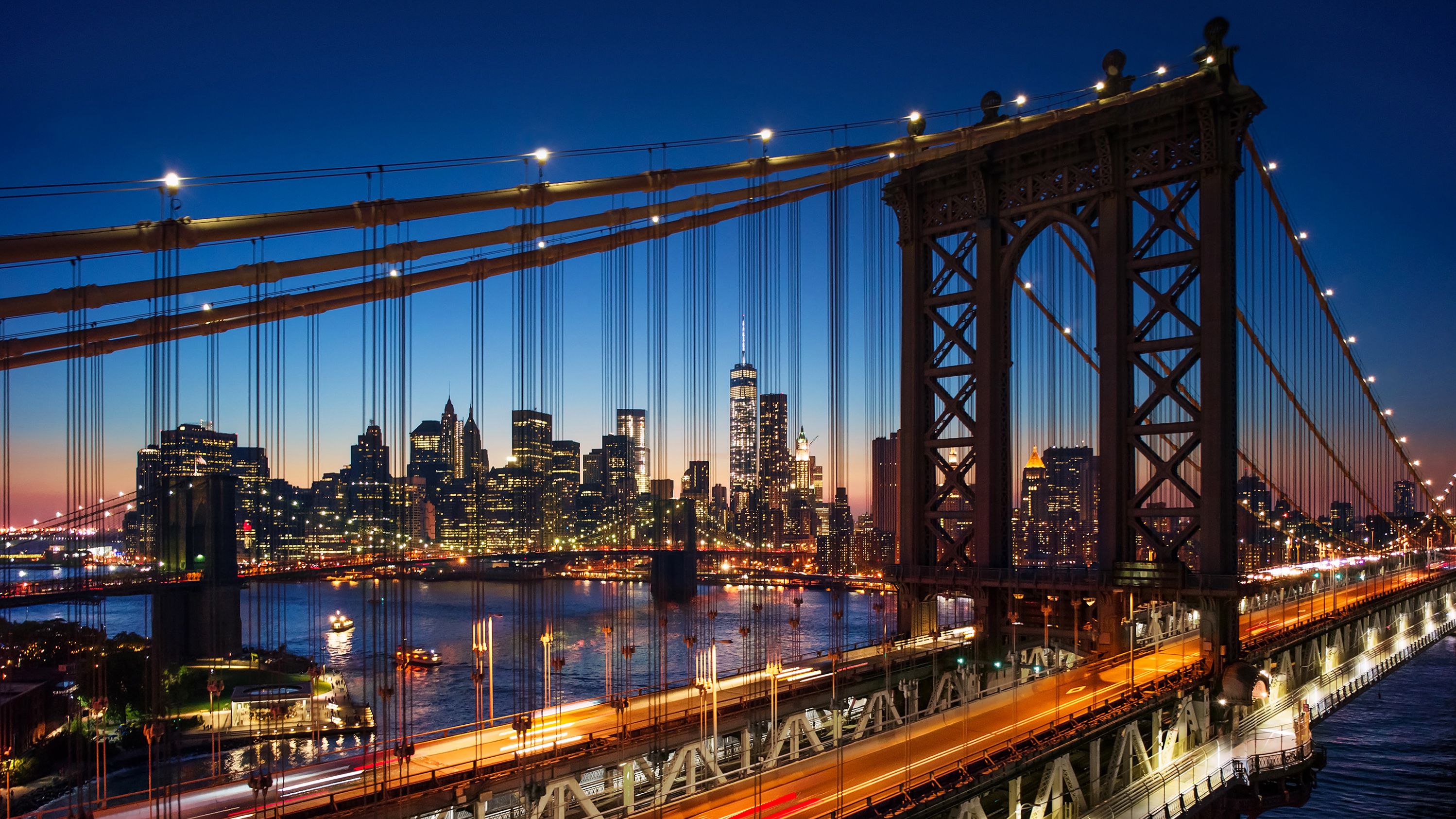 Amerika-New-York-sunset-over-Manhattan-en-Manhattan-Bridge
