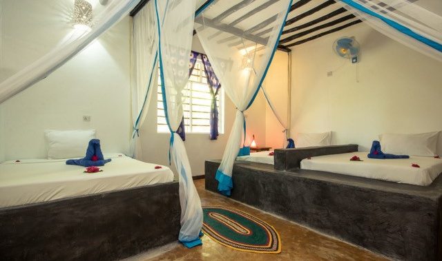 Familiekamer met zeezicht singles kamer in Blue Reef Sport and Fishing Lodge in Jambiani op Zanzibar