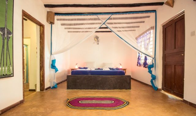 Familiekamer met zeezicht double kamer in Blue Reef Sport and Fishing Lodge in Jambiani op Zanzibar