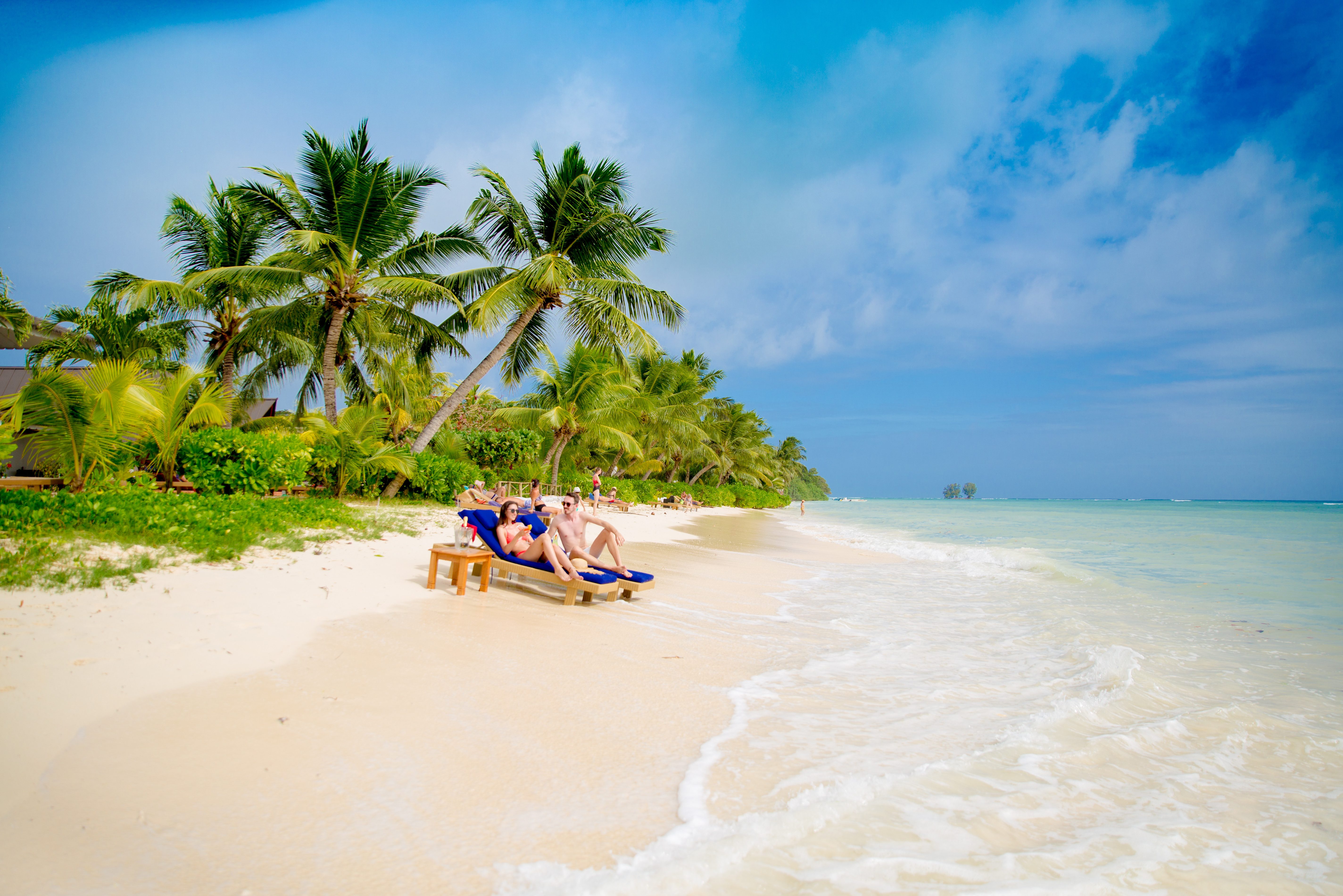 Het strand van het La Digue Island Lodge in de Seychellen