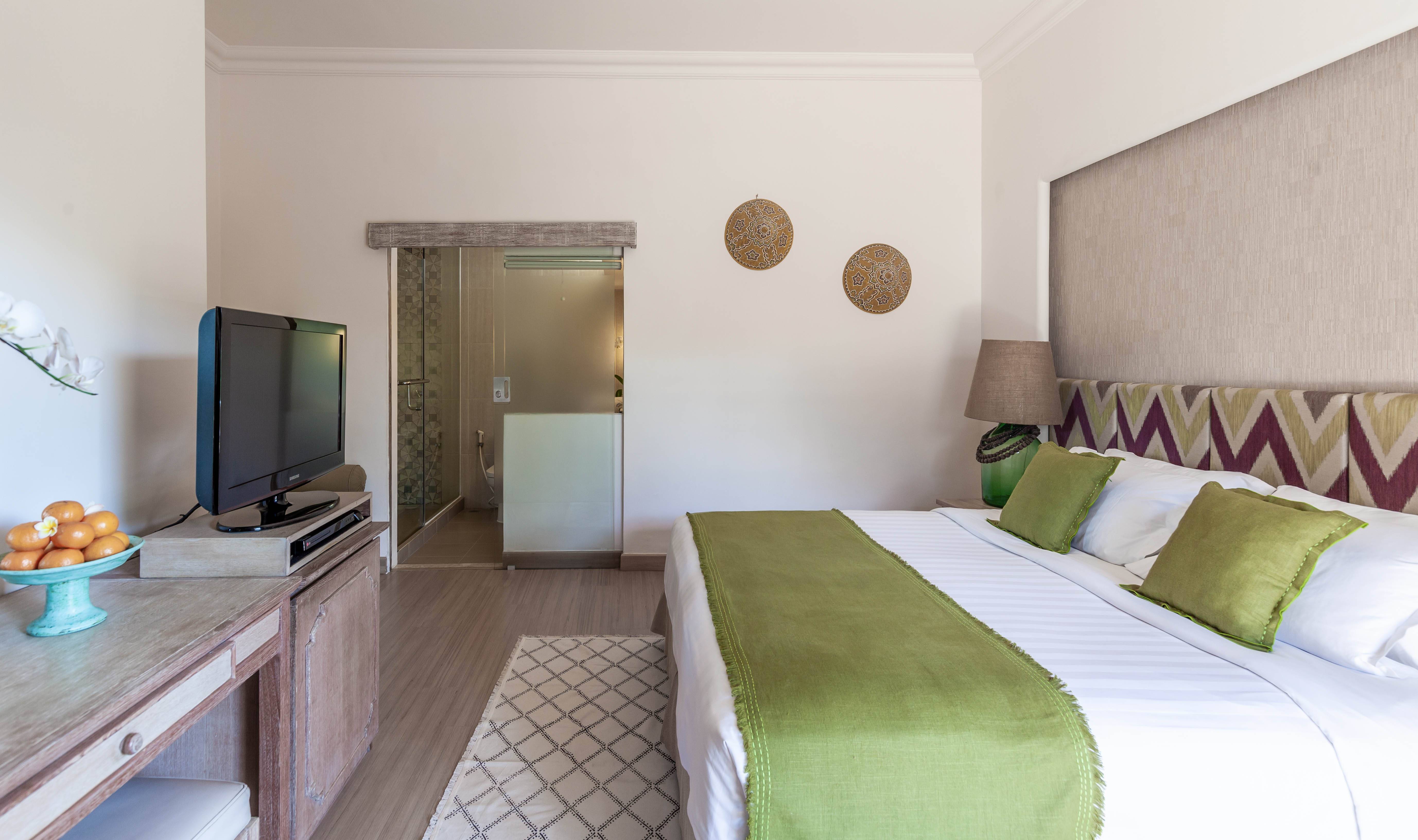 Indonesie-Bali-Legian-Bali-Mandira-Beach-Resort-en-Spa-Deluxe-Cottage-upperfloor