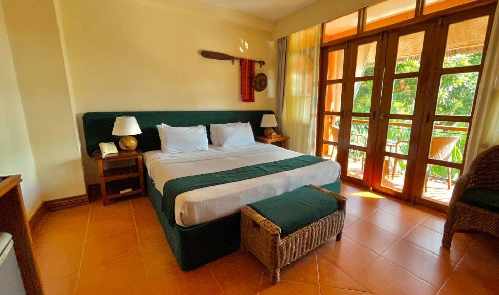 Deluxe kamer van Coco Grove Siquijor