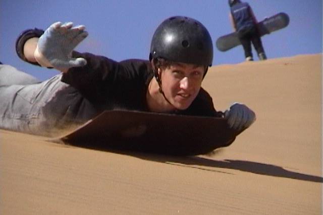 Sandboarden bij Swakopmund in de Namib Desert
