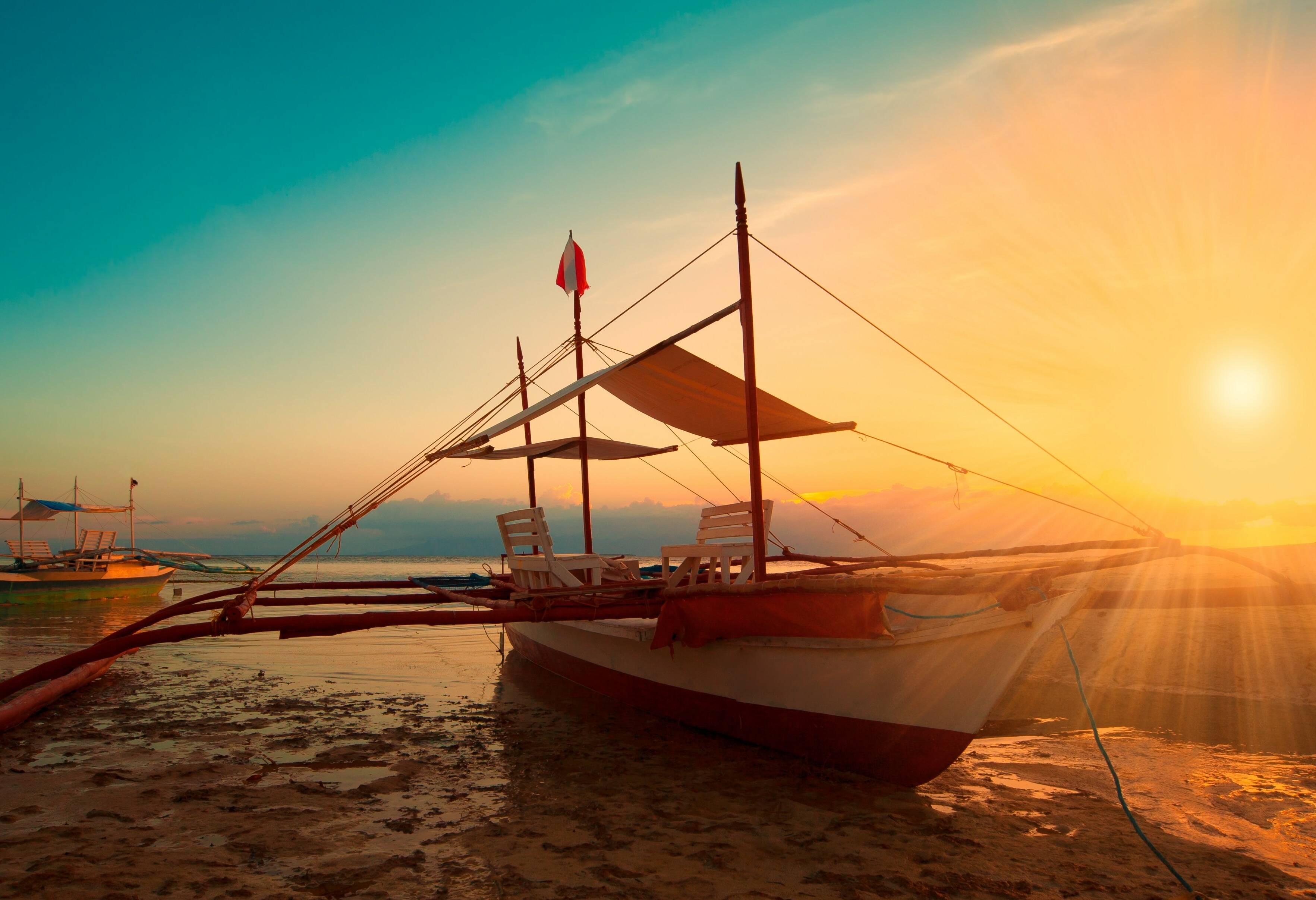 Boten op het strand van Mactan